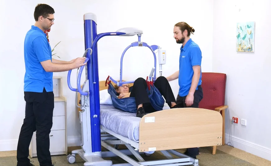 use of mechanical lifters with two carers